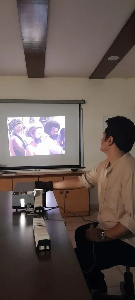 A slide of the Himalayas from Swami Sundaranand's collection, projected in a darkened room